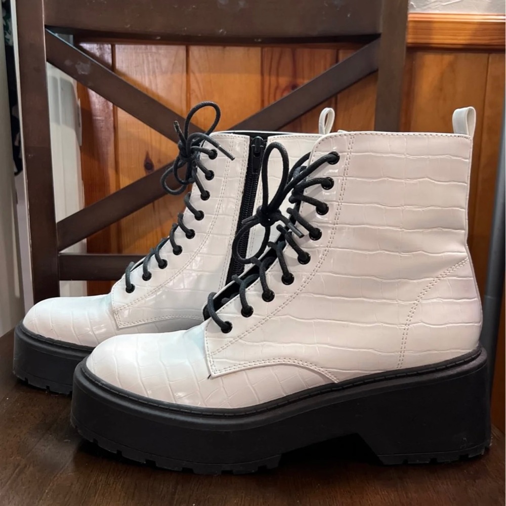White combat boots with black laces